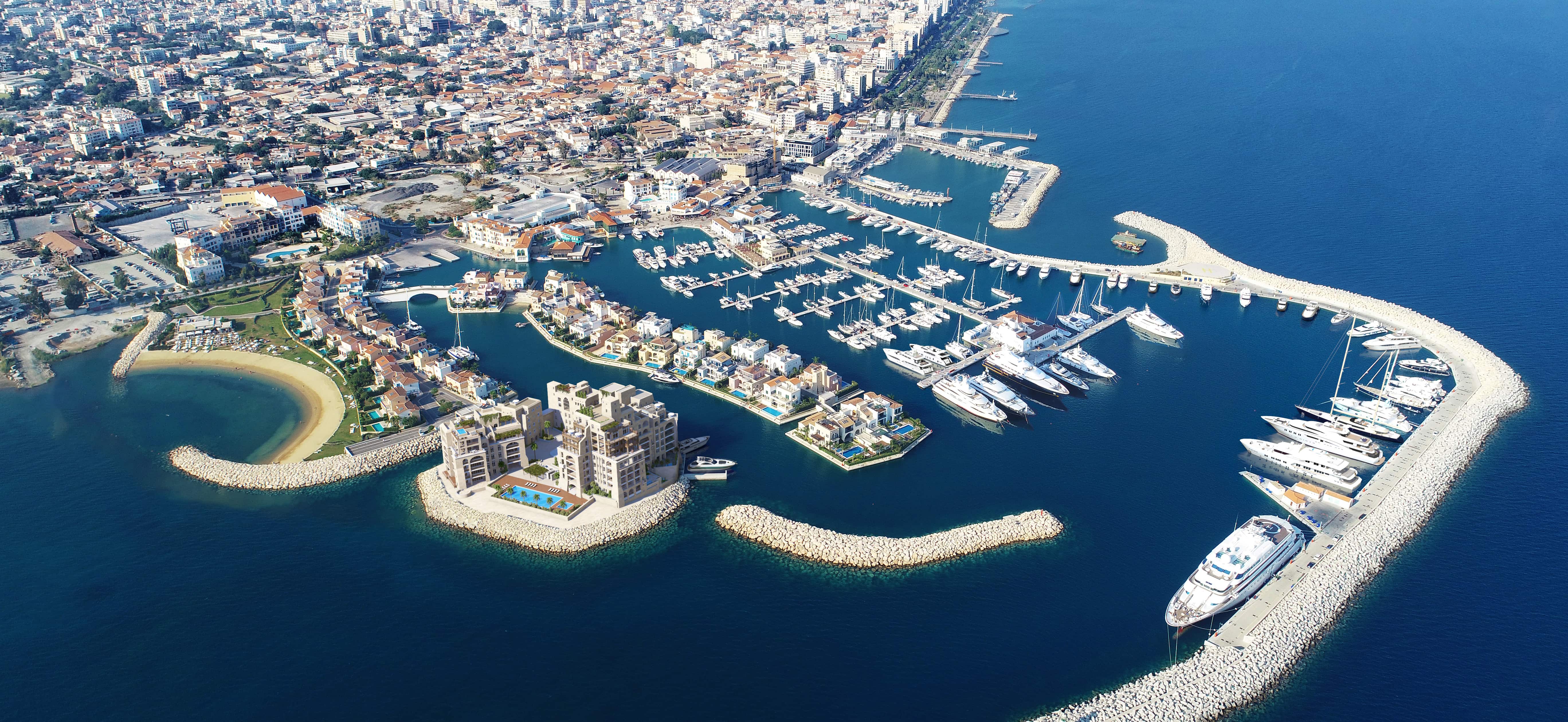 Marina surrounded by blue sea and luxury residences